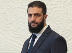 シリアの暫定指導者は、暴力がエスカレートする中で団結を呼びかける
